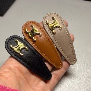 Gold Logo Hair Clips Set